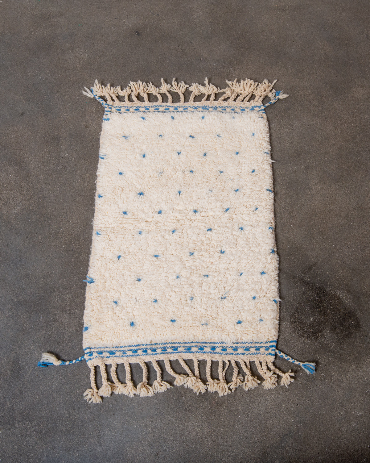 Modern, designer, handcrafted Berber rug from Morocco. Beniourain carpet with beautiful colours and patterns and fluffy wool texture.